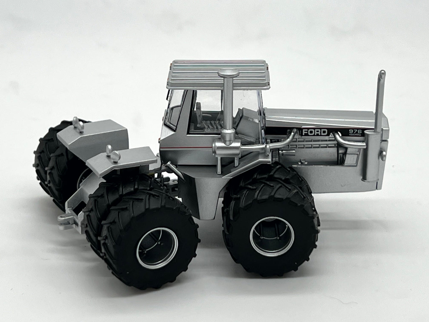 Silver Ford 976 30.5 duals Tires